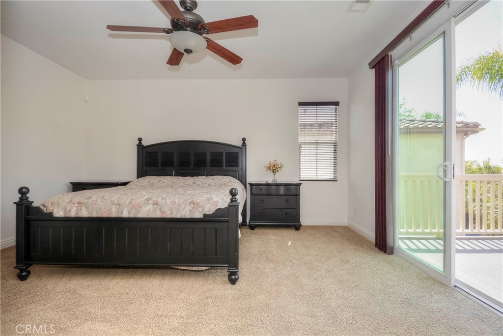 1803 Glen Rosa Street Upland, CA 91784 - Photo 33 of 68 a bedroom with a bed dresser and a window