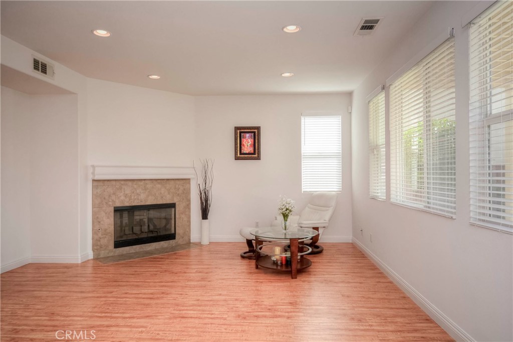 1803 Glen Rosa Street Upland, CA 91784 - Photo 4 of 68 a living room with furniture and a fireplace