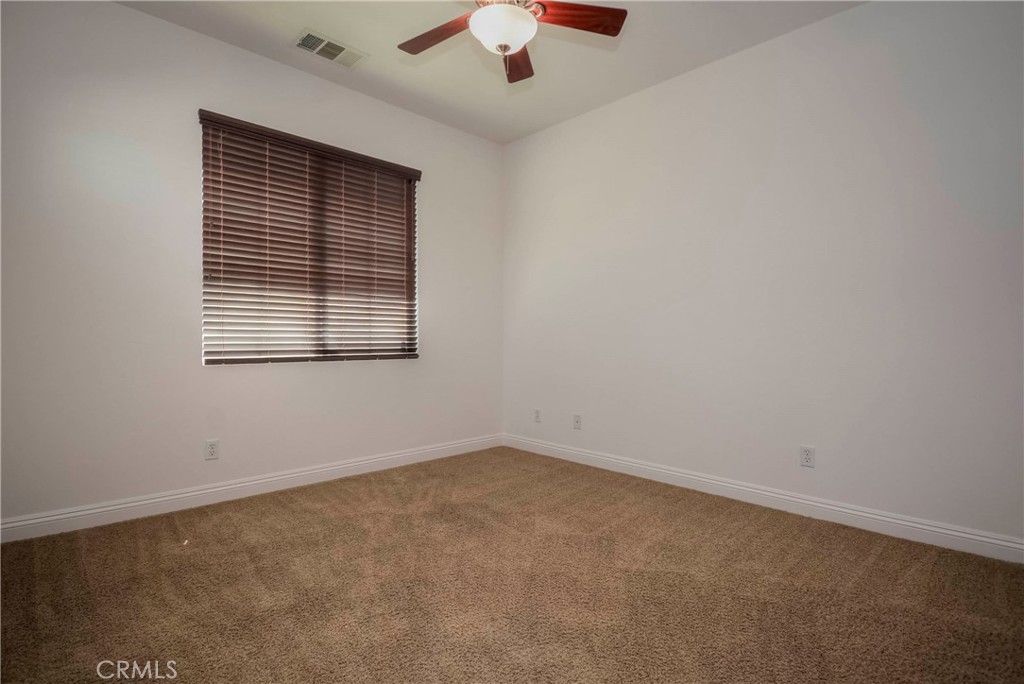 1803 Glen Rosa Street Upland, CA 91784 - Photo 57 of 68 an empty room with a window
