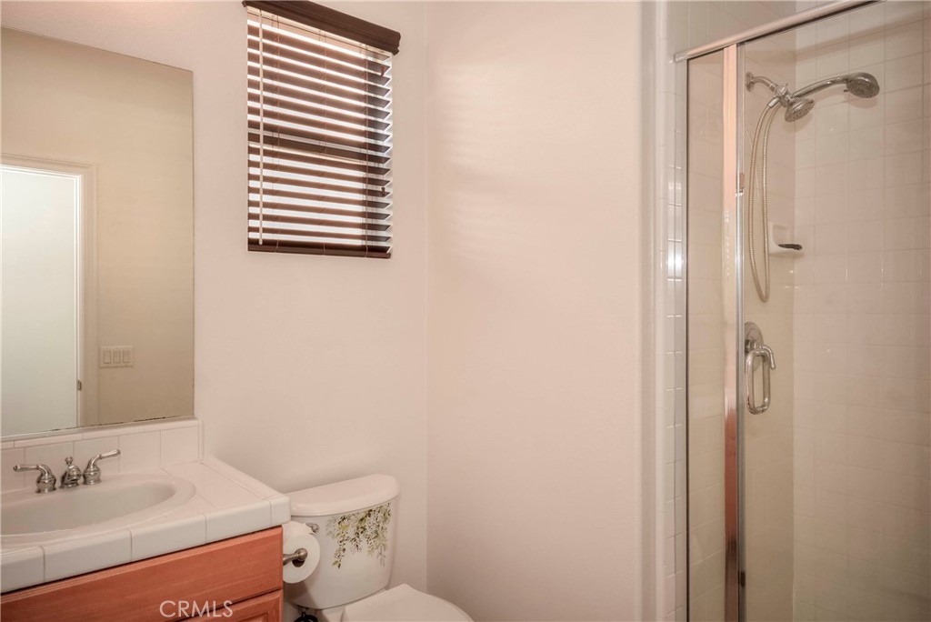 1803 Glen Rosa Street Upland, CA 91784 - Photo 61 of 68 a bathroom with a sink and a toilet