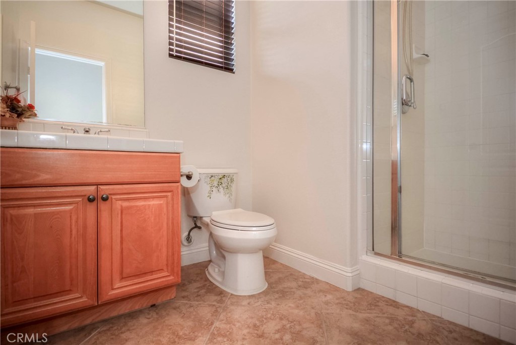 1803 Glen Rosa Street Upland, CA 91784 - Photo 62 of 68 a bathroom with a toilet and a sink