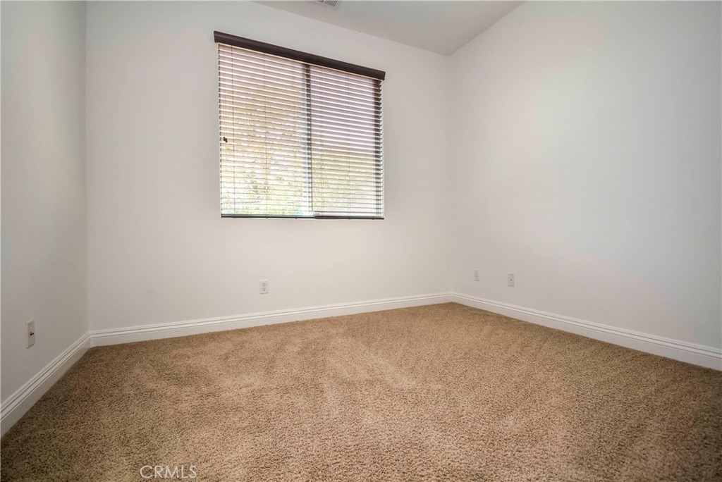 1803 Glen Rosa Street Upland, CA 91784 - Photo 63 of 68 an empty room with a window