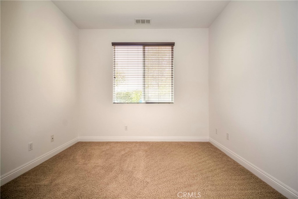 1803 Glen Rosa Street Upland, CA 91784 - Photo 64 of 68 an empty room with a window