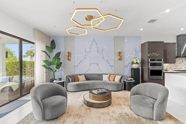 a view of a dining room with furniture and window