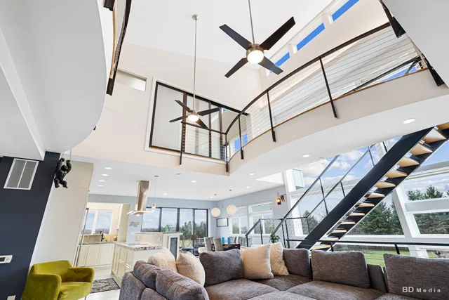 a kitchen with stainless steel appliances kitchen island granite countertop a sink and cabinets