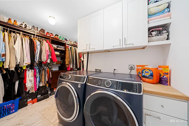 a view of a balcony with lake view and a large window