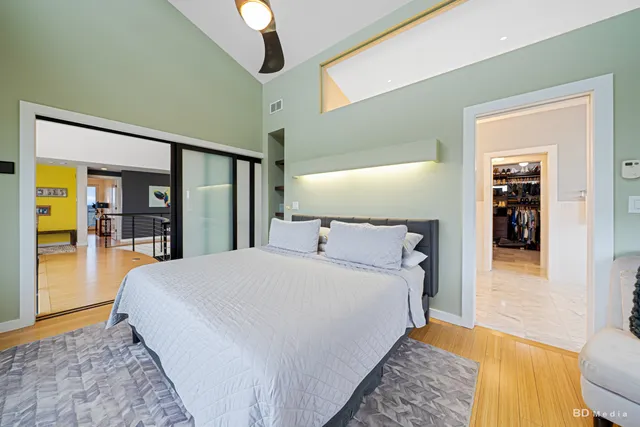 a view of a house with a yard table and chairs