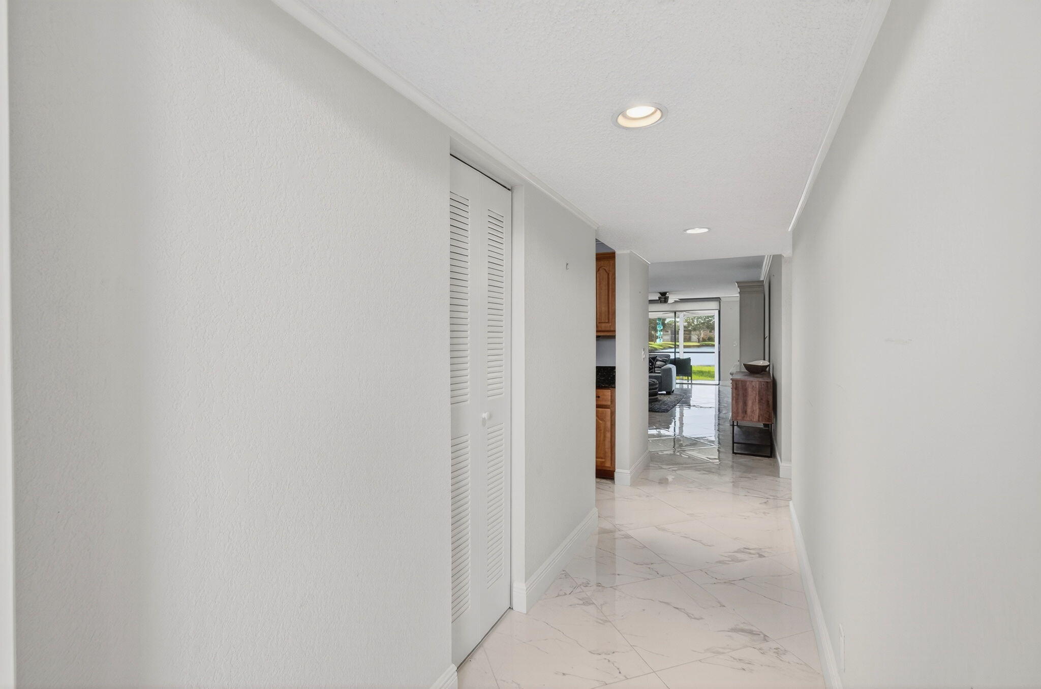 5574 Witney Drive, Unit 109 Delray Beach, FL 33484 - Photo 32 of 114 a view of hallway with wooden floor