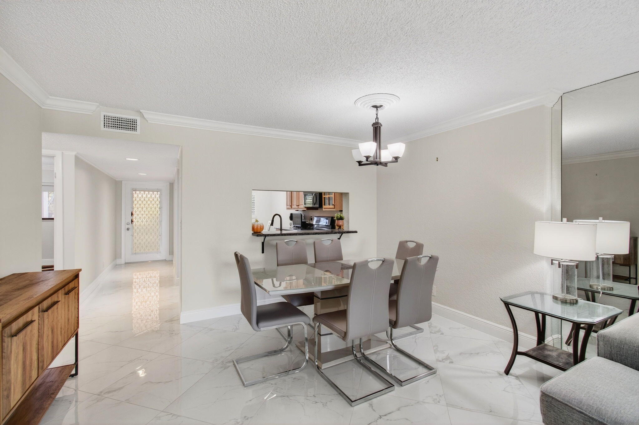 5574 Witney Drive, Unit 109 Delray Beach, FL 33484 - Photo 39 of 114 a view of a dining room with furniture