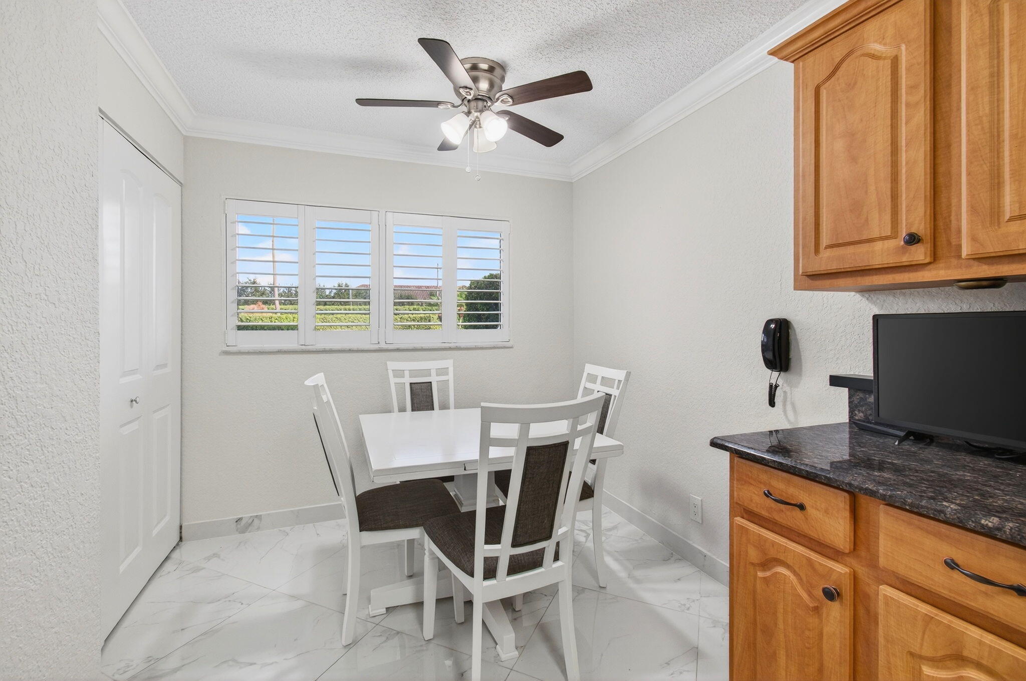 5574 Witney Drive, Unit 109 Delray Beach, FL 33484 - Photo 44 of 114 a view of a dining room with furniture and a window