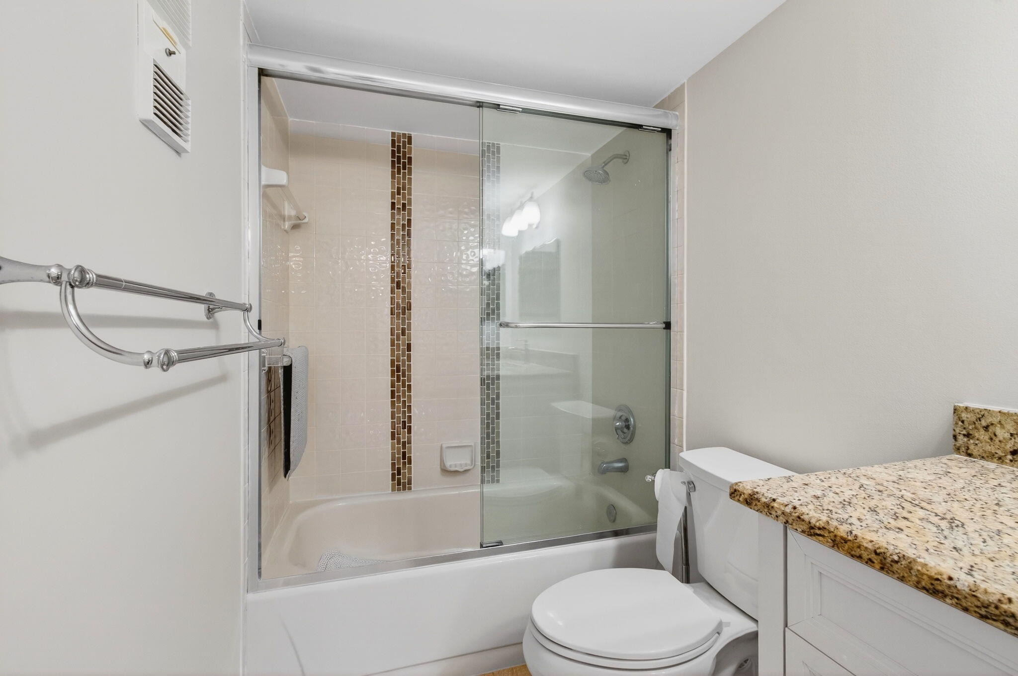 5574 Witney Drive, Unit 109 Delray Beach, FL 33484 - Photo 49 of 114 a bathroom with a granite countertop sink toilet and shower