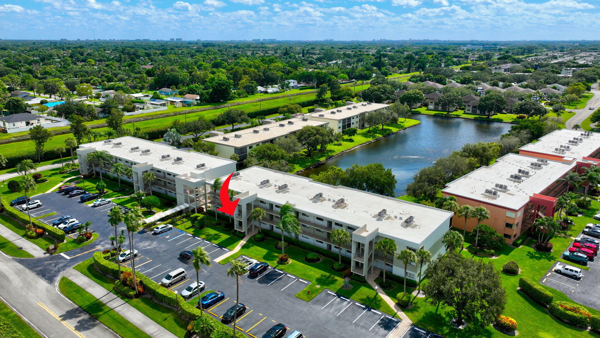 5574 Witney Drive, Unit 109 Delray Beach, FL 33484 - Photo 68 of 114 an aerial view of a houses with outdoor space and lake view
