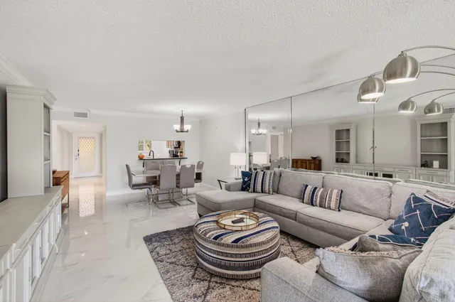 a view of a lake with houses in the background