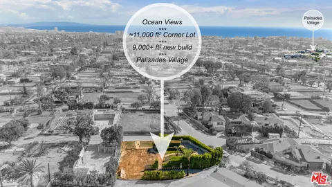 a view of a yard with wooden fence