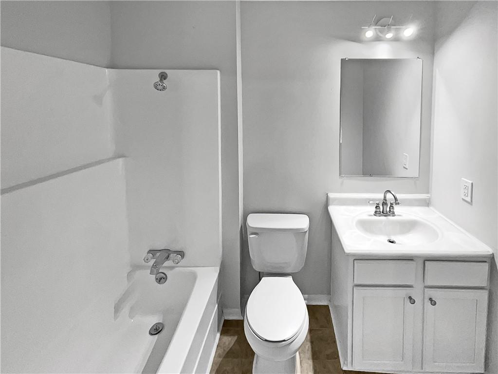 4425 Amy Road Snellville, GA 30039 - Photo 14 of 19 a bathroom with a sink toilet and shower