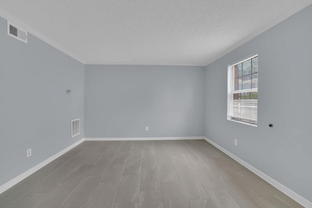 1424 Springleaf Circle Southeast Smyrna, GA 30080 - Photo 4 of 38 a view of an empty room with a window