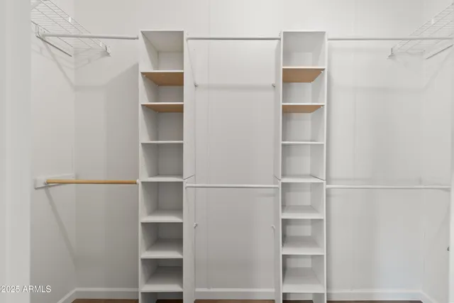 a bathroom with a shower and toilet