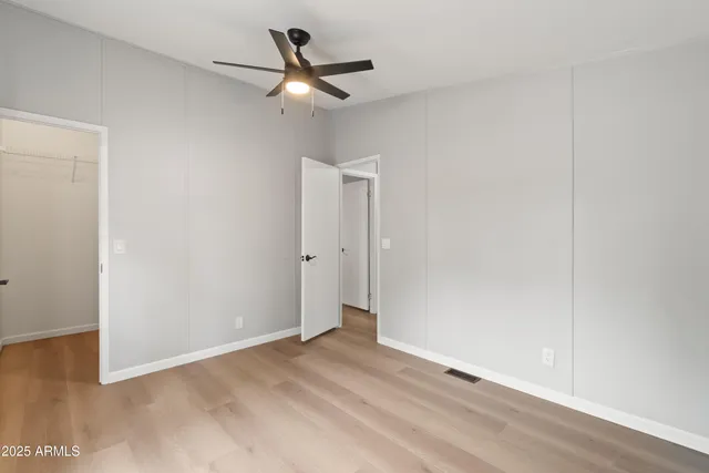 a view of storage and utility room with racks on the wall