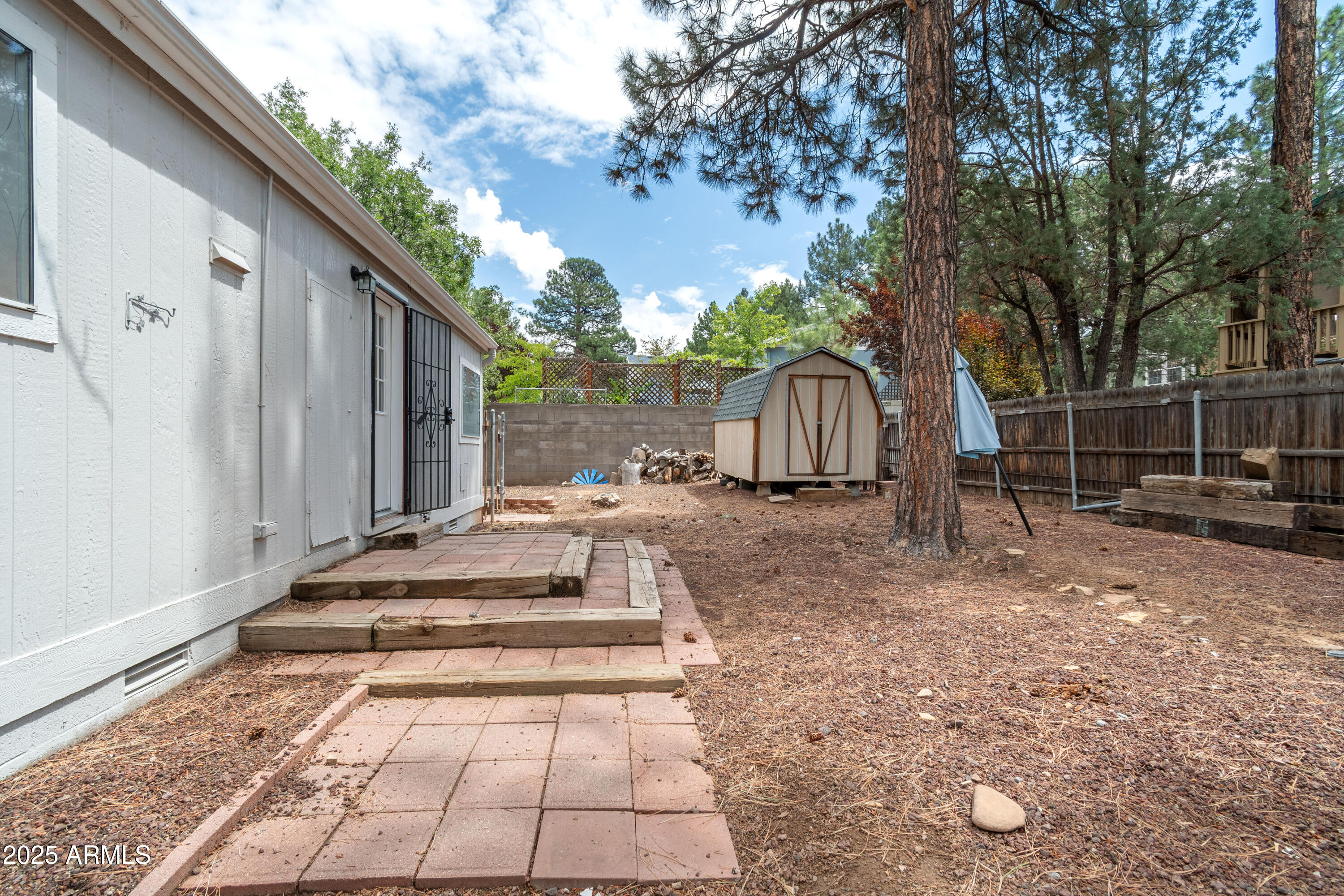 391 Timber Ridge Loop Show Low, AZ 85901 - Photo 26 of 36 Brian Durbin Photo Backyard