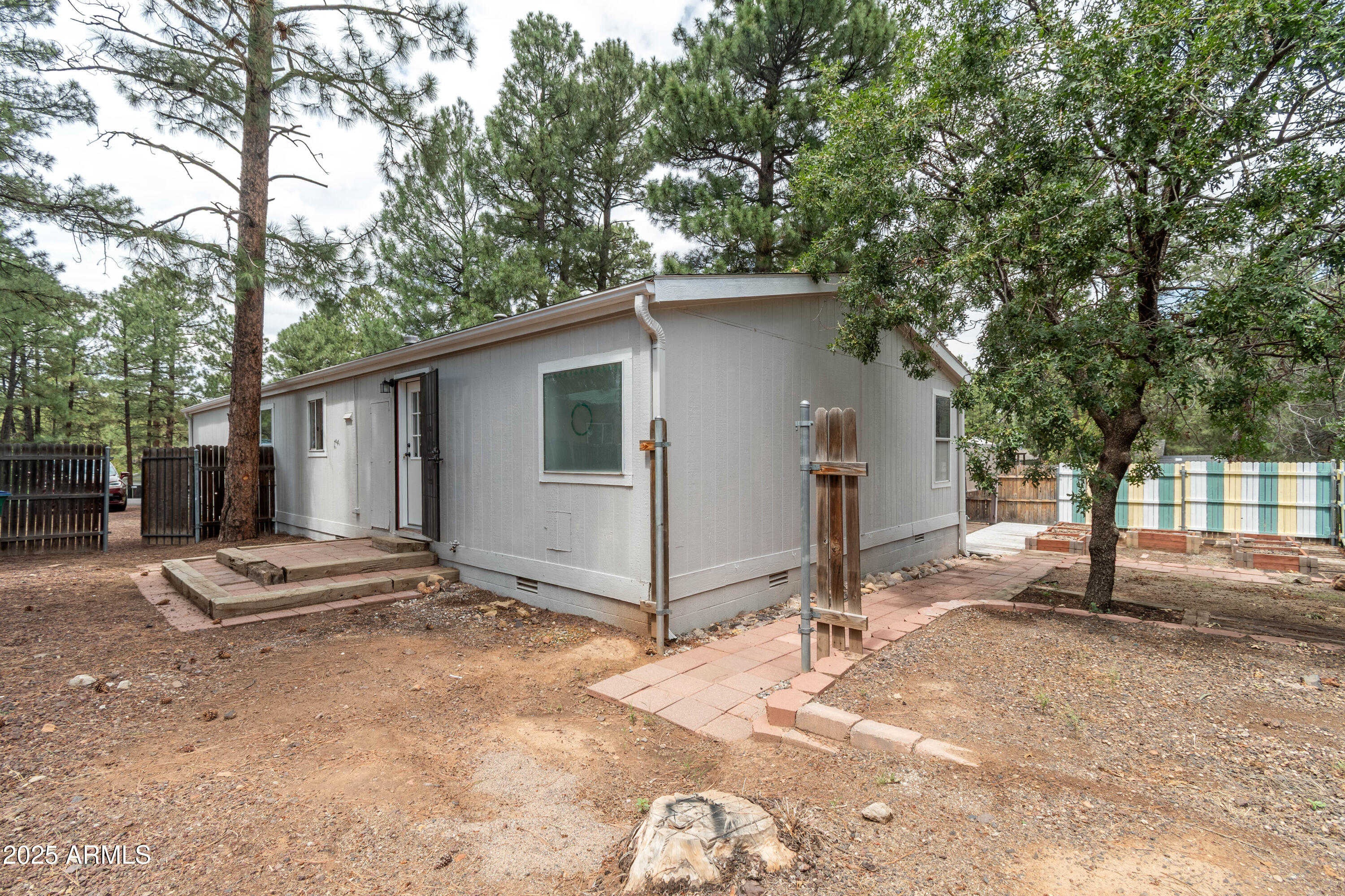 391 Timber Ridge Loop Show Low, AZ 85901 - Photo 27 of 36 Brian Durbin Photo Backyard