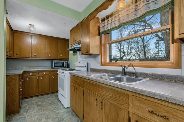 $989,900 | 1593 Pine Cone Road North, Sartell, MN 56377