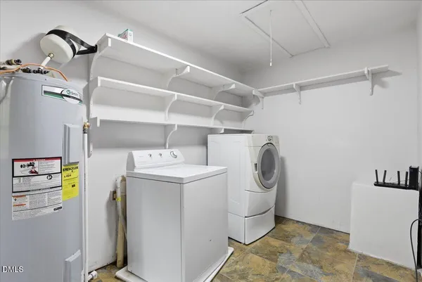 a white toilet sitting next to a shower