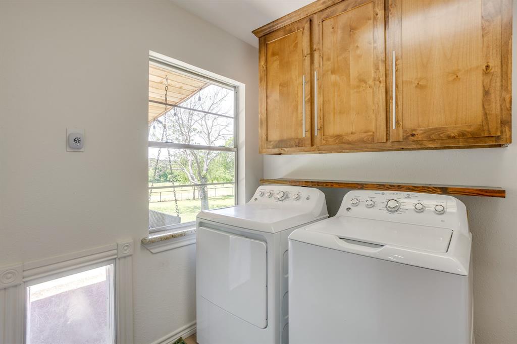 6345 Silver Creek Azle Road Azle, TX 76020 - Photo 20 of 40 a utility room with dryer and washer