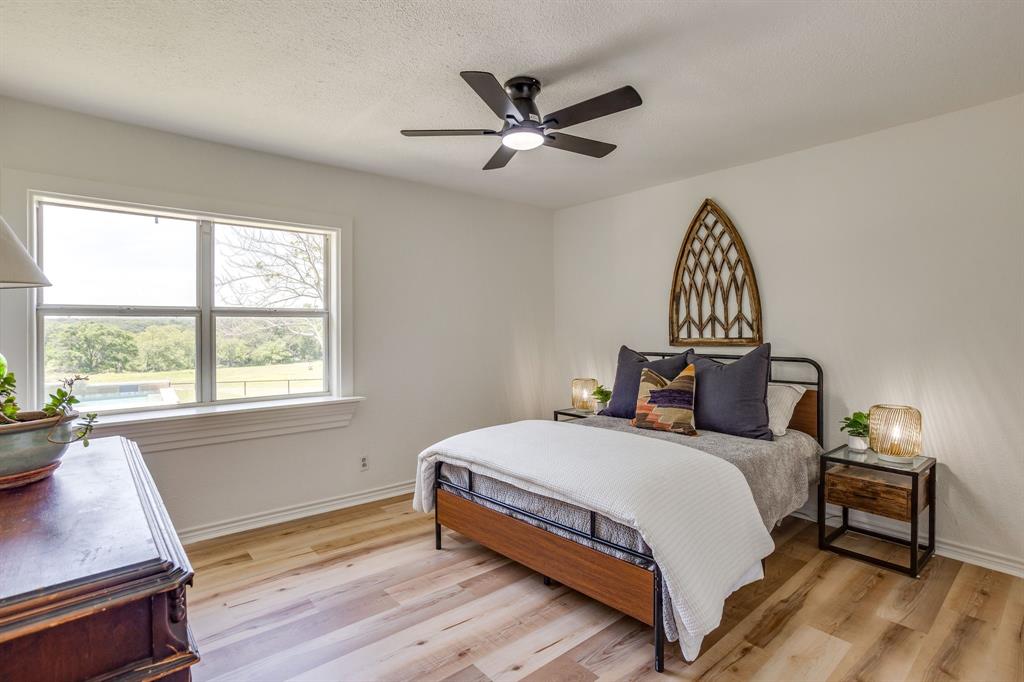6345 Silver Creek Azle Road Azle, TX 76020 - Photo 26 of 40 a bed room with a bed and a window