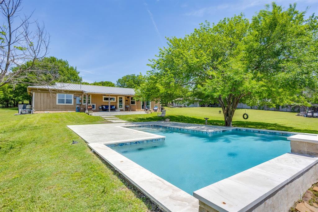 6345 Silver Creek Azle Road Azle, TX 76020 - Photo 29 of 40 a view of a house with a yard