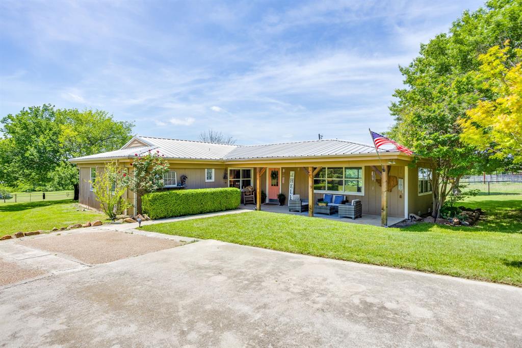 6345 Silver Creek Azle Road Azle, TX 76020 - Photo 6 of 40 a view of a yard in front of a house