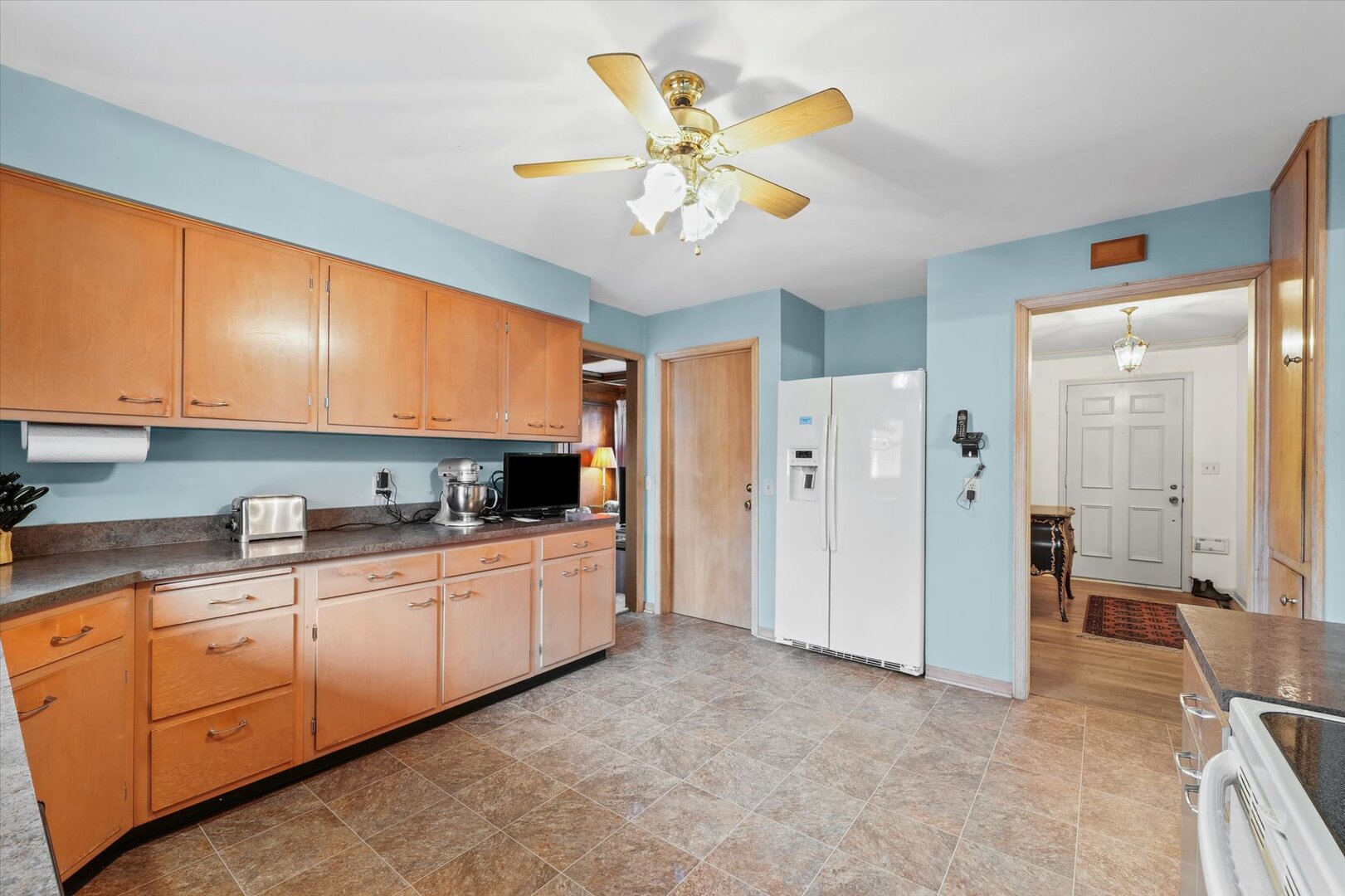 901 West Healey Street Champaign, IL 61821 - Photo 12 of 30 a large kitchen with stainless steel appliances granite countertop a refrigerator and a sink