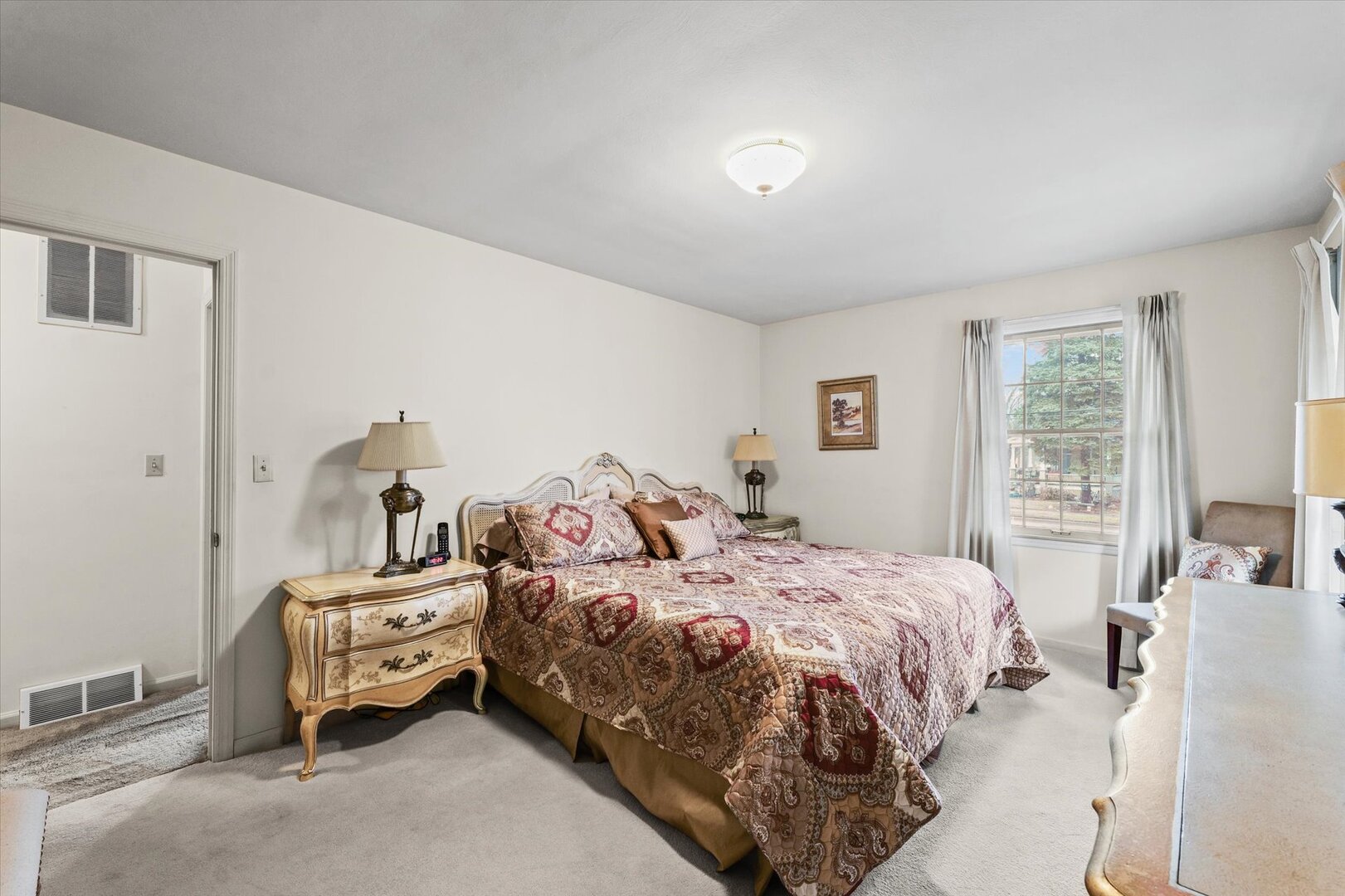 901 West Healey Street Champaign, IL 61821 - Photo 19 of 30 a bedroom with a bed and a couch