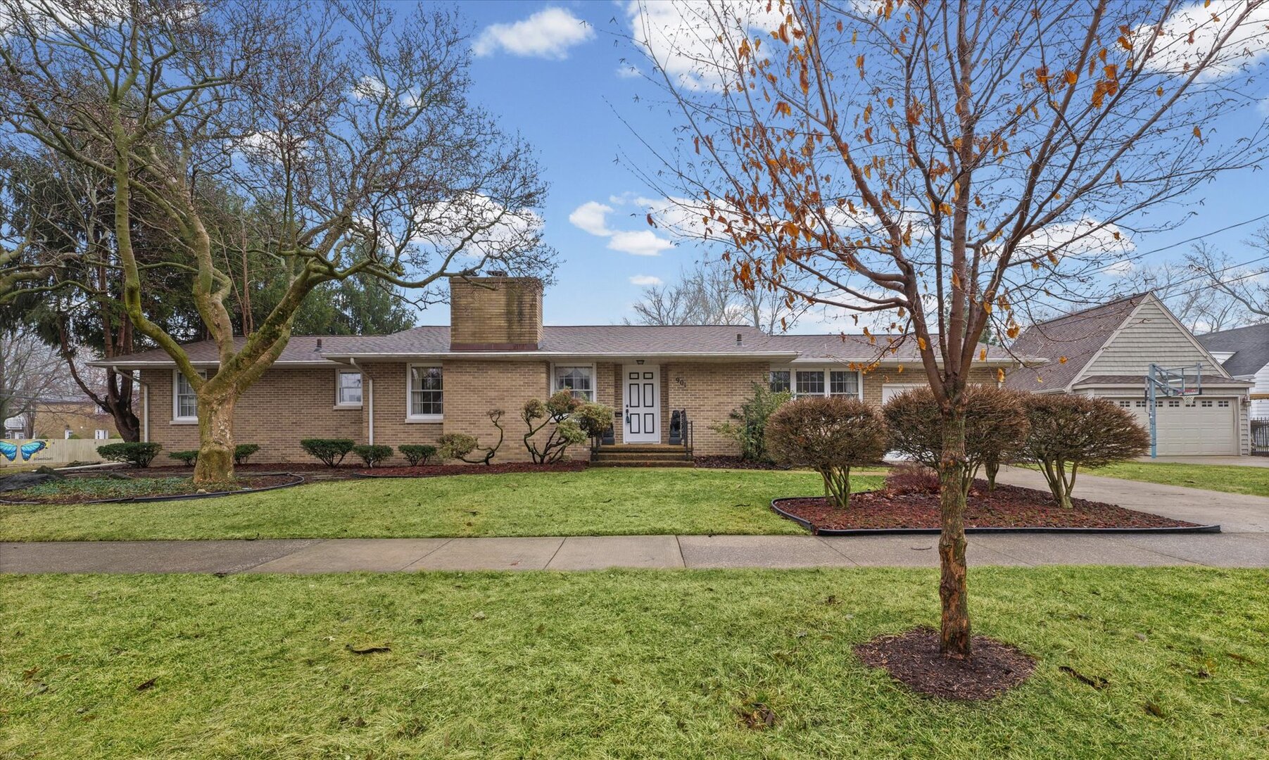 901 West Healey Street Champaign, IL 61821 - Photo 2 of 30 a front view of a house with a yard and tree