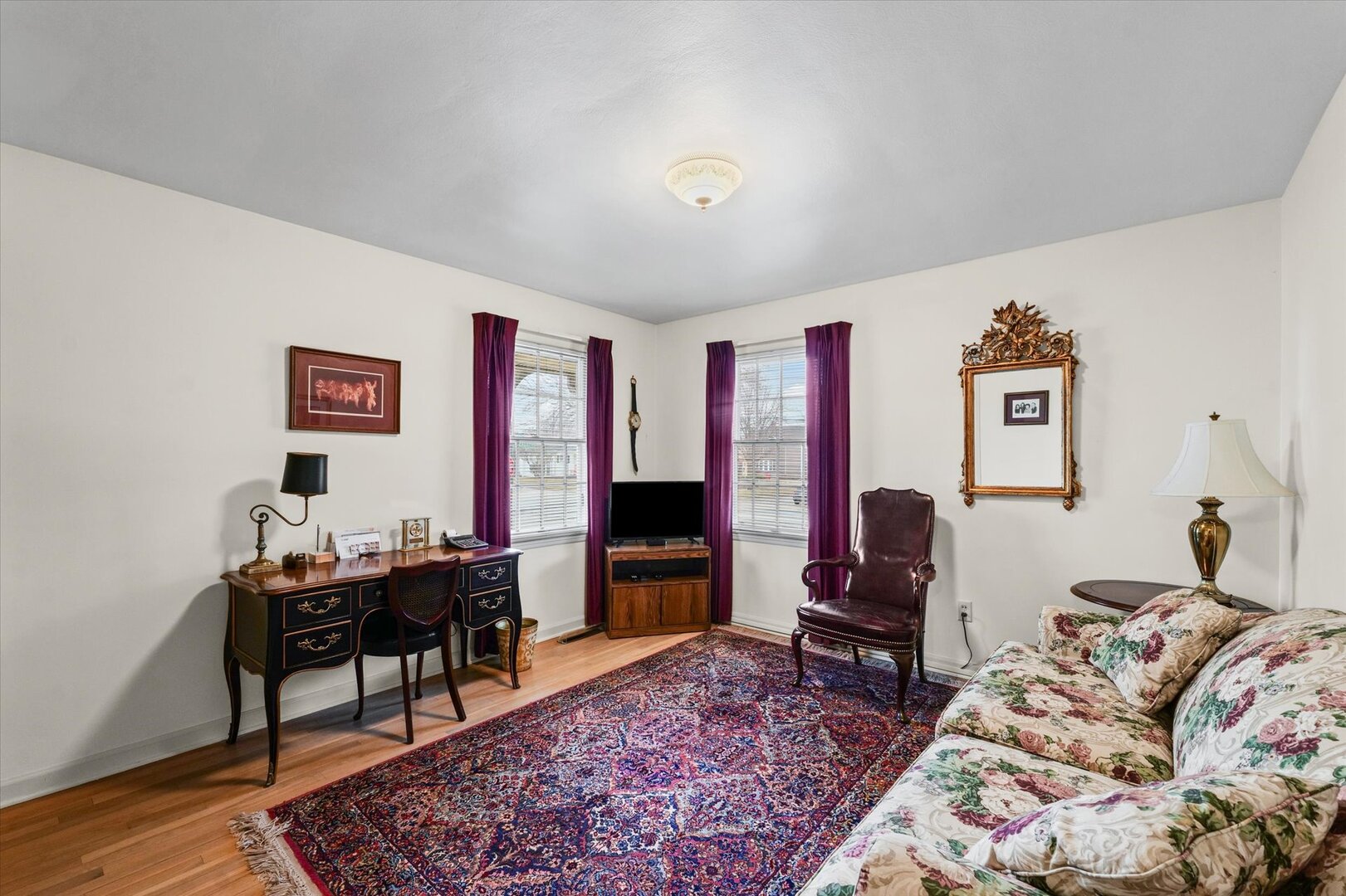 901 West Healey Street Champaign, IL 61821 - Photo 21 of 30 a living room with furniture rug and wooden floor