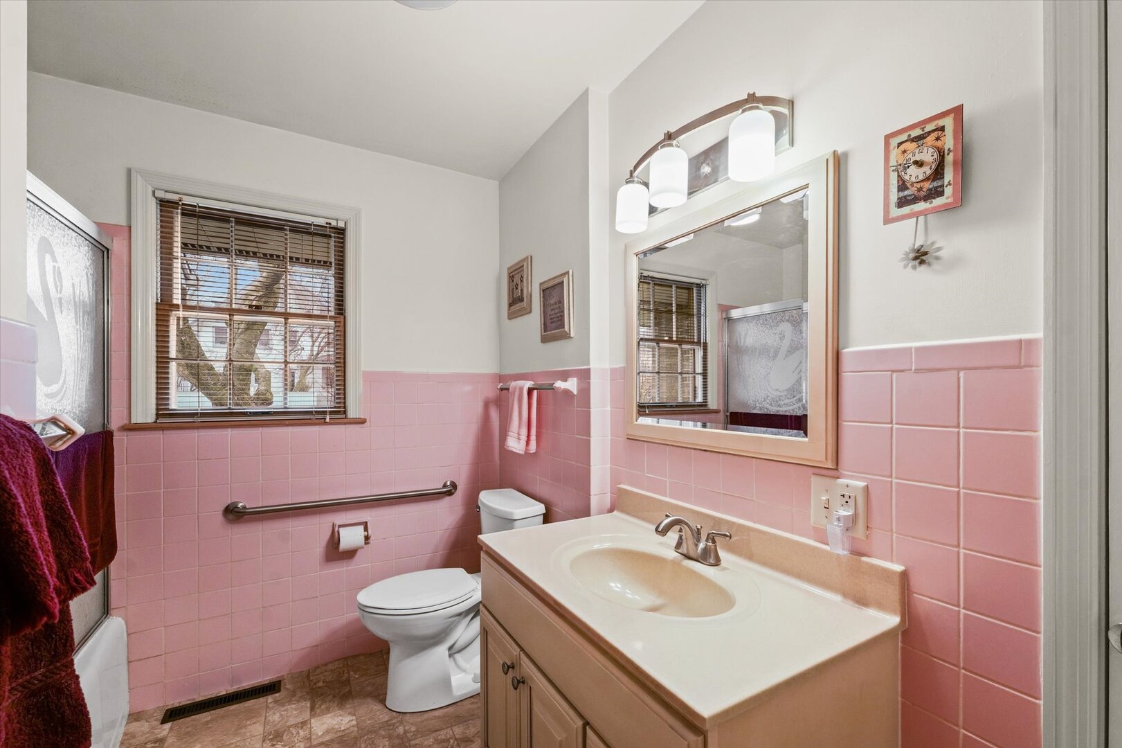 901 West Healey Street Champaign, IL 61821 - Photo 23 of 30 a bathroom with a sink toilet and mirror