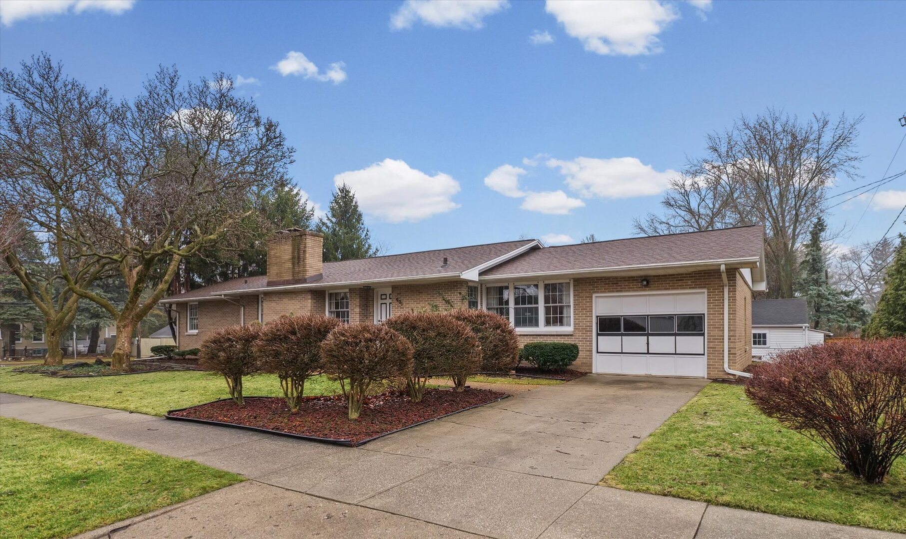 901 West Healey Street Champaign, IL 61821 - Photo 3 of 30 a front view of a house with garden