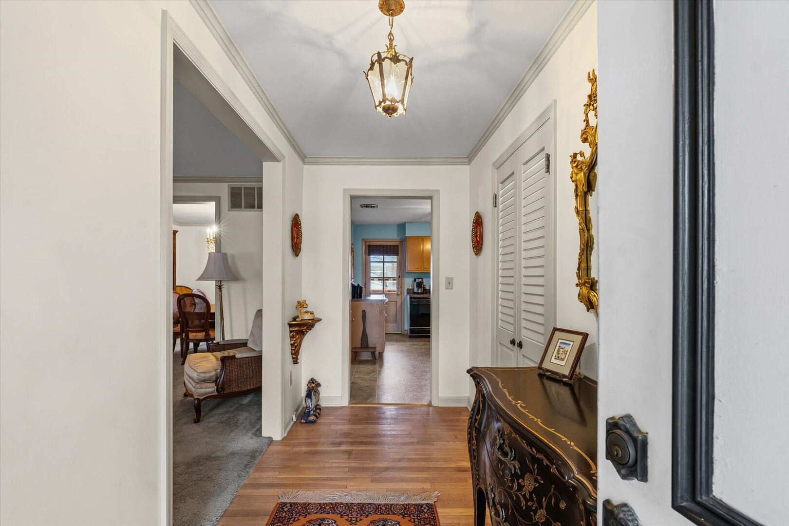 901 West Healey Street Champaign, IL 61821 - Photo 5 of 30 a hallway with a view of living room