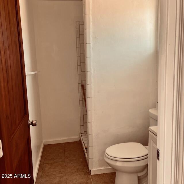 330 2nd Street Bowie, AZ 85605 - Photo 8 of 10 a white toilet sitting next to a shower
