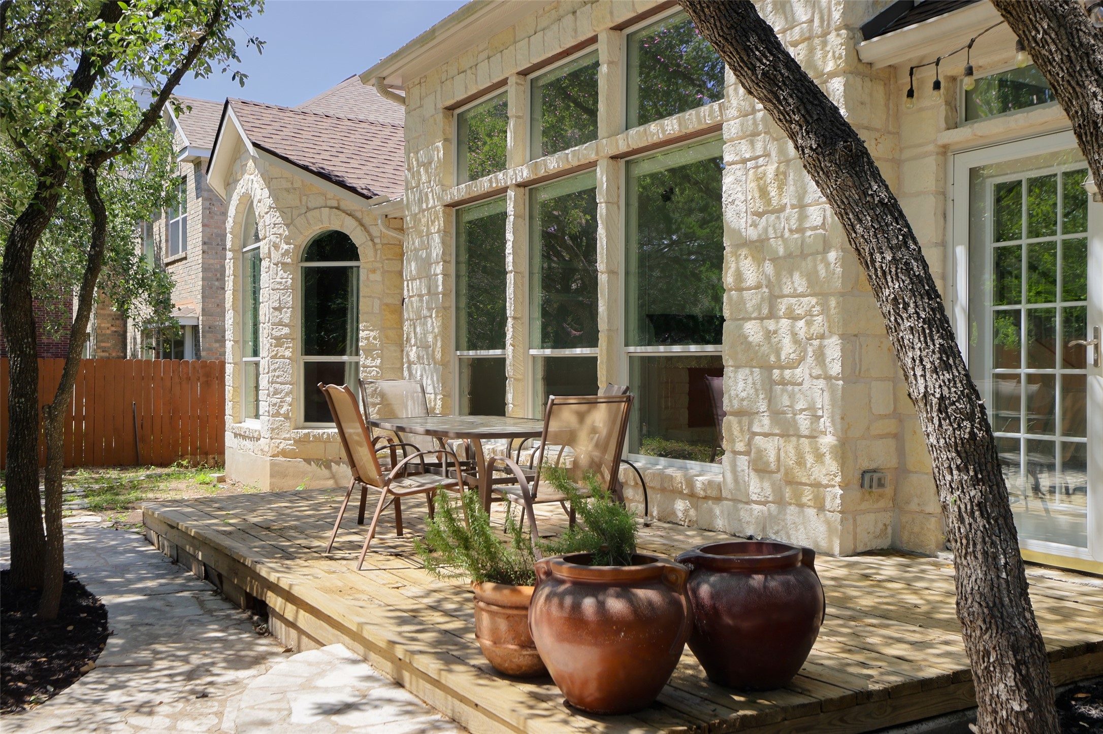 7921 Davis Mountain Pass Austin, TX 78726 - Photo 32 of 40 a view of an outdoor space with seating area
