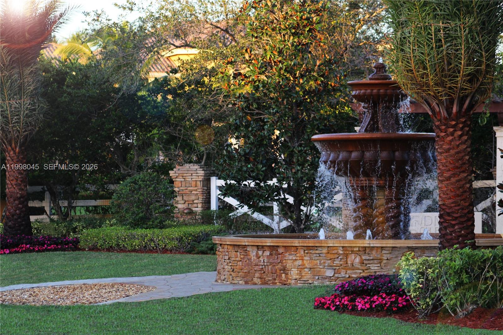 5400 Ascot Terrace Southwest Ranches, FL 33331 - Photo 8 of 13 a front view of a house with garden