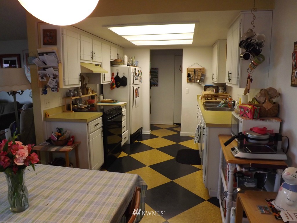 630 Boulevard Bellingham, WA 98225 - Photo 5 of 13 a kitchen with a sink and cabinets