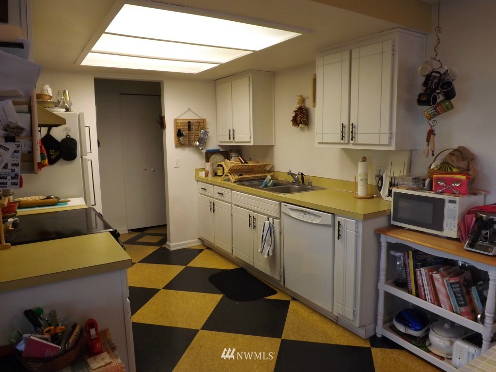 630 Boulevard Bellingham, WA 98225 - Photo 6 of 13 a kitchen with a sink and cabinets