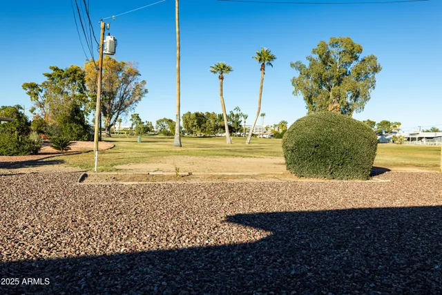a kitchen with stainless steel appliances granite countertop a refrigerator stove and sink