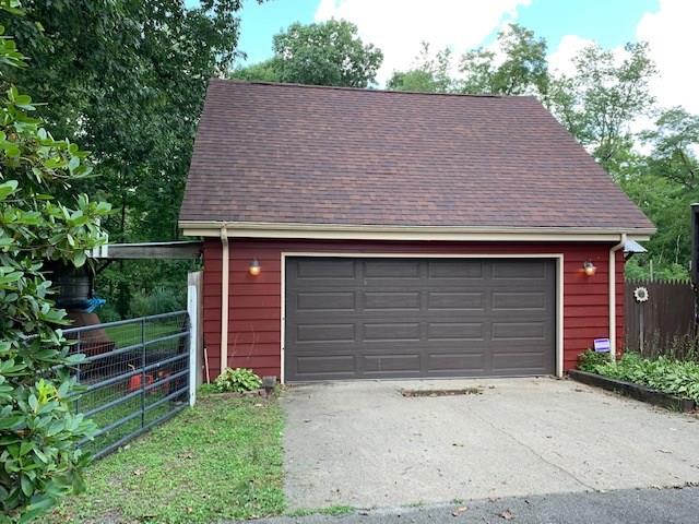 129 Trouttown Road Hunker, PA 15639 - Photo 3 of 25 2 car detached garage with carport on left!