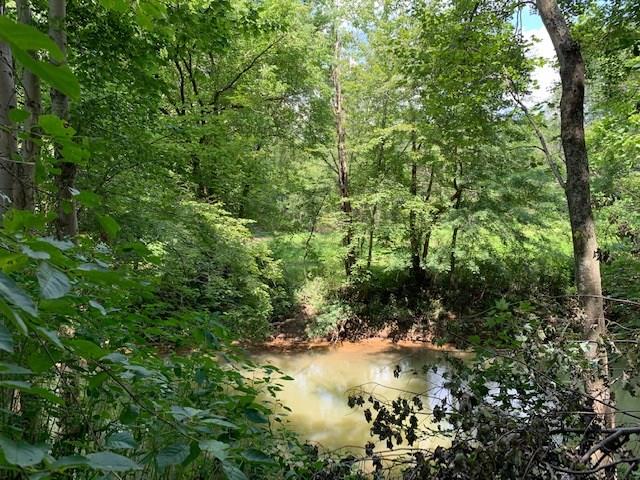 129 Trouttown Road Hunker, PA 15639 - Photo 4 of 25 Sewickley Creek abuts the property out back. Fish or kayak!