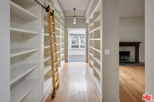 a view of livingroom with hardwood floor and a ceiling fan