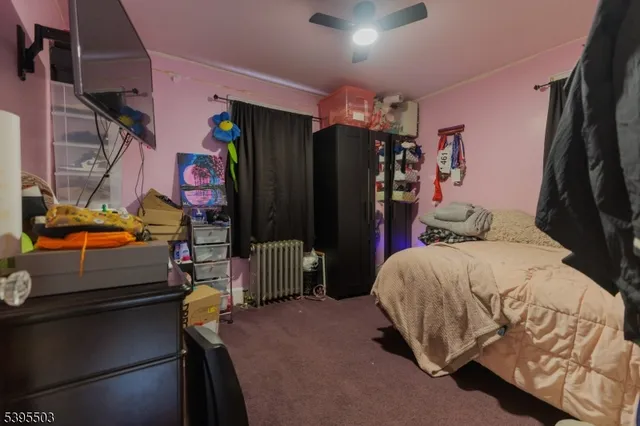 a bedroom with a bed and a closet