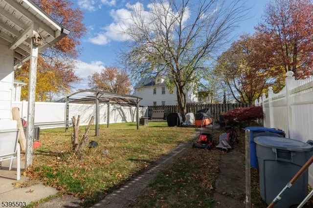 a house view with a backyard space