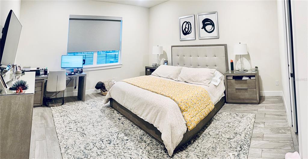 1994 Spring Shower Circle Kissimmee, FL 34744 - Photo 15 of 29 a bed room with a bed and a television