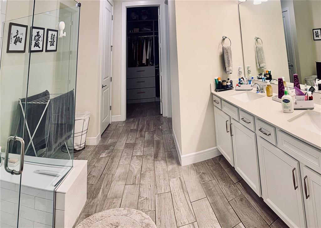 1994 Spring Shower Circle Kissimmee, FL 34744 - Photo 16 of 29 a bathroom with a sink and mirror